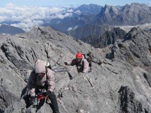 Traveling-Au-Cheval-on-the-summit-ridge-of-Carstensz-Pyramid-300×300