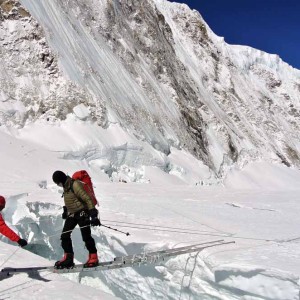 Climbers negotiating a crevasse in the Western CWM of Mount Everest