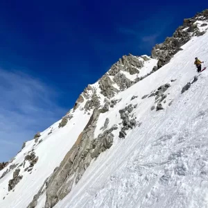 Steep skiing in the Cosmiques Couloir, Chamonix.