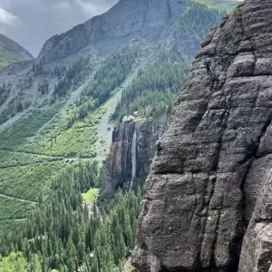 Multi-pitch climbing in front of Bridal Veil Falls. Telluride, CO.