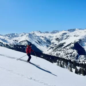 Skiing alpine bowls from Campfire Ranch Red Mountain Pass in the San Juan Mountains.