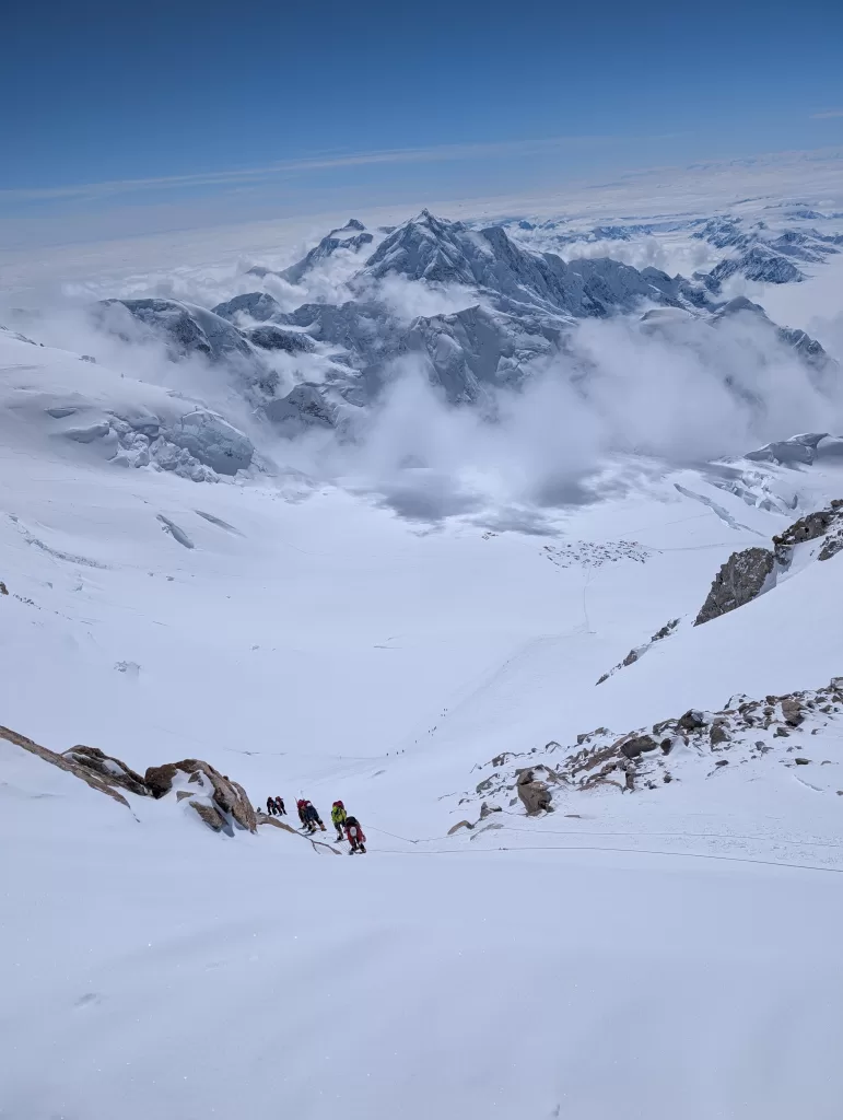 Mountain Trip teams on the coming down the fixed lines